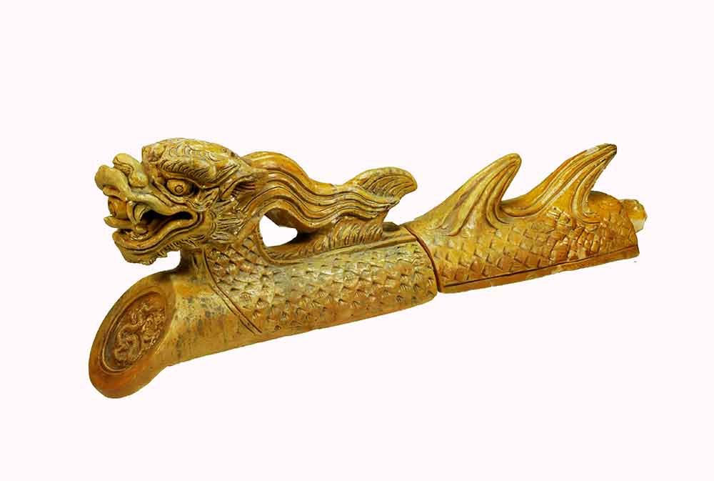 A dragon-shaped, golden-enamel